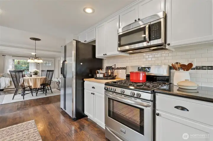 Stainless appliances and subway tile backsplash