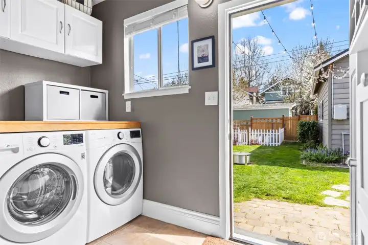 Main floor laundry w/ access to the fenced backyard