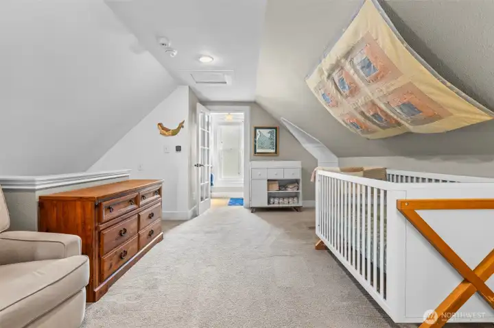 large sitting area outside of primary suite