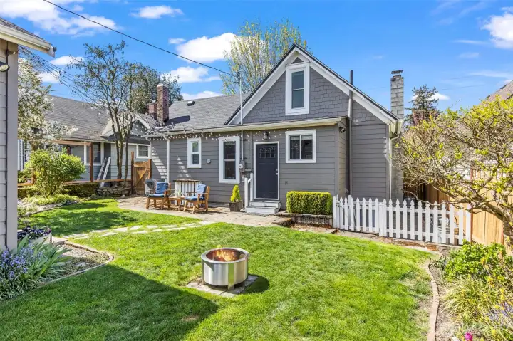 Relax in the back! Private, fully fenced back yard (new fence was being installed on the same day as photography)