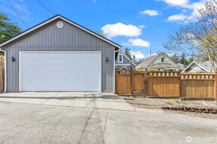 Oversized 2-car garage of off wide alley space. TONS of storage!