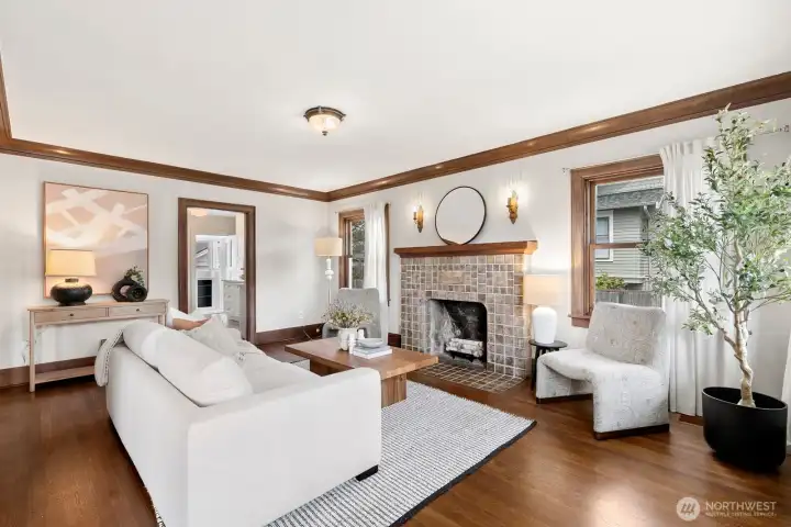 The natural light in this home is abundant! Note the entrance to the kitchen pictured here.