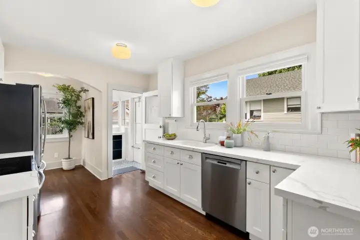 The kitchen was classically updated and has a mudroom that leads to the driveway and garage.