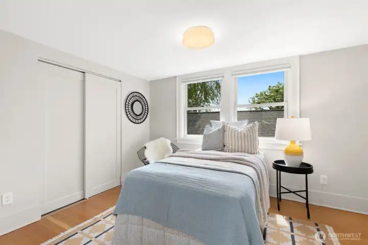 Head upstairs to the first of two bedrooms!