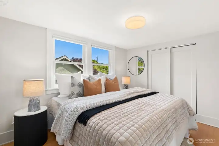 Second bedroom upstairs fits a large bed.