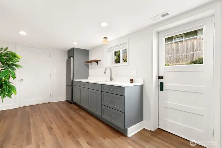 The lower level would make for the perfect AirBnb or future ADU. It has it's own separate entrance right from the driveway!