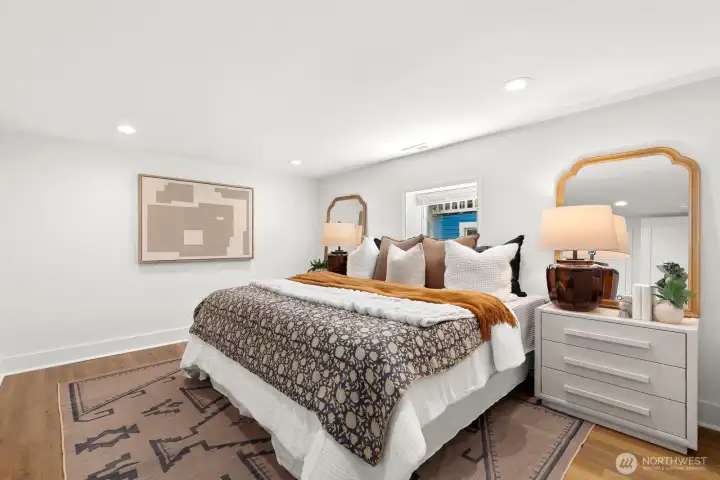 Large bedroom with window egress downstairs - and south facing light. You don't feel like you're in a basement!