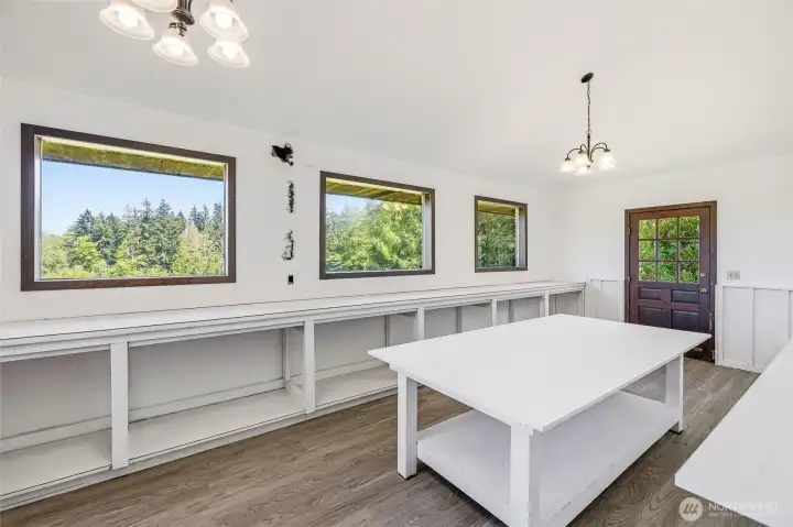 Additional room off garage, not included in homes sq ft noted.