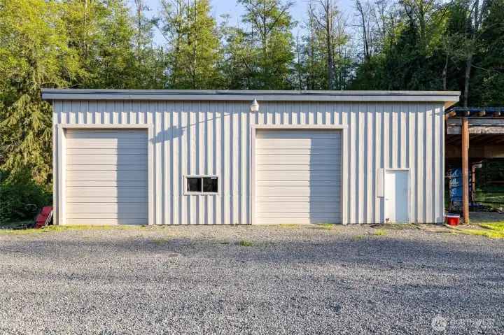 Detached garage featuring fully finished room inside.