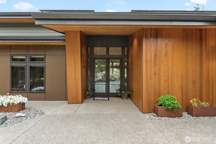 Modern, functional and welcoming.  No steps at all entry points of home and beautiful double doors make this home ADA accessible.