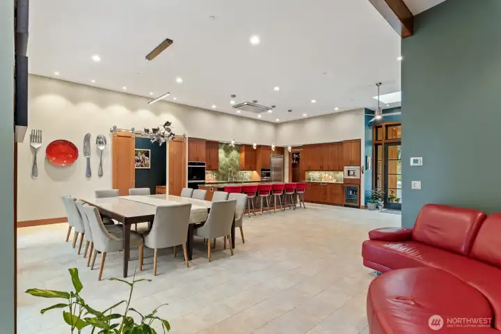 Amazing flow to this home.  The custom colors are warm and welcoming.  Sitting area between dining and living rooms is perfect to take in the views of back patio area.