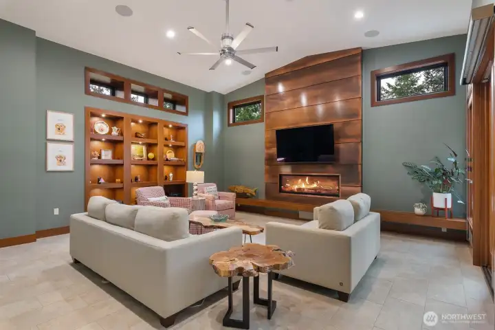 Custom built ins and surround sound in living room.