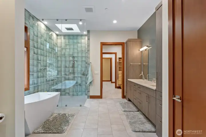 Spa like primary bath.  Deep soaking tub, custom tile shower with multiple shower heads. Toto bidet.