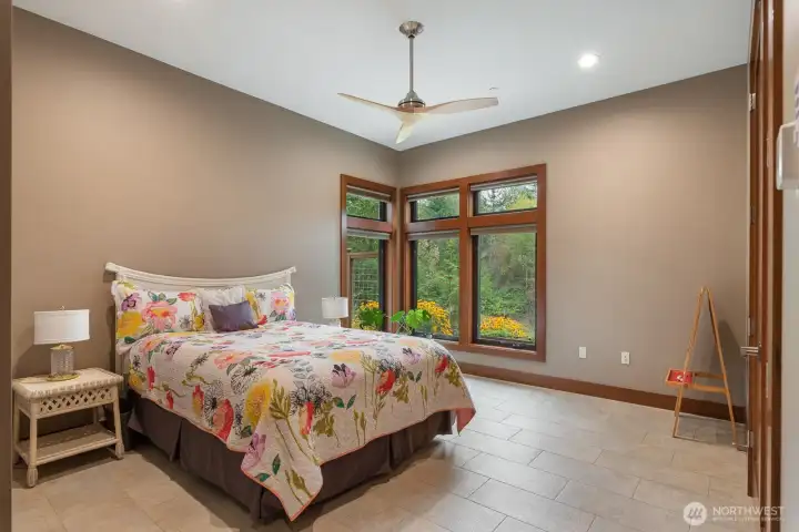 One of two good sized secondary bedrooms sits at front of home.