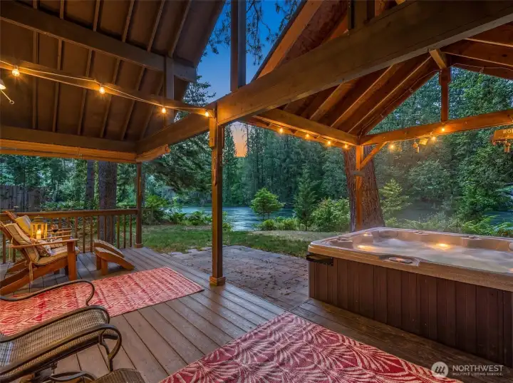 Covered riverfront deck, private hot tub, and the soothing sounds of the Wenatchee River just steps away—this mountain retreat was designed for year-round enjoyment in one of Plain's most sought-after waterfront settings. Covered riverfront deck, private hot tub, and the soothing sounds of the Wenatchee River just steps away—this mountain retreat was designed for year-round enjoyment in one of Plain's most sought-after waterfront settings.