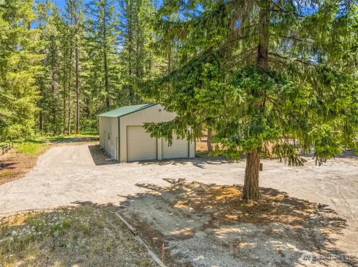 An outstanding addition to the property, the oversized shop offers room for all your mountain lifestyle needs—from snowmobiles and ATVs to boats, tools, and recreational gear. Positioned within the private forest setting, it provides flexibility, storage, and functionality rarely found in a waterfront retreat. An outstanding addition to the property, the oversized shop offers room for all your mountain lifestyle needs—from snowmobiles and ATVs to boats, tools, and recreational gear. Positioned within the private forest setting, it provides flexibility, storage, and functionality rarely found in a waterfront retreat.