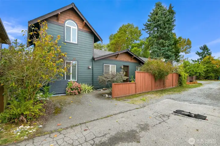 Front Exterior – Charming Craftsman-inspired exterior with mature landscaping, private entry fencing, and welcoming curb appeal tucked into a peaceful Columbia neighborhood setting. Front Exterior – Charming Craftsman-inspired exterior with mature landscaping, private entry fencing, and welcoming curb appeal tucked into a peaceful Columbia neighborhood setting.