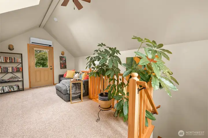 ersatile upper-level bonus room with vaulted ceilings, mini split, and abundant natural light offers flexible space for a media room, home office, creative studio, or guest retreat. ersatile upper-level bonus room with vaulted ceilings, mini split, and abundant natural light offers flexible space for a media room, home office, creative studio, or guest retreat.