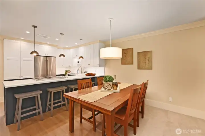 The quartz breakfast bar provides lots of extra seating for your parties.