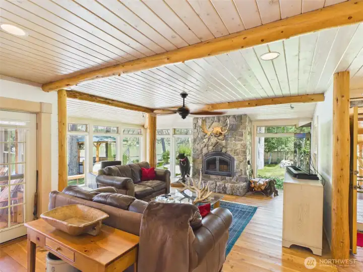 Beautiful hardwood floors, custom millwork and an entire wall of windows fill the home with natural light while capturing spectacular lake views.