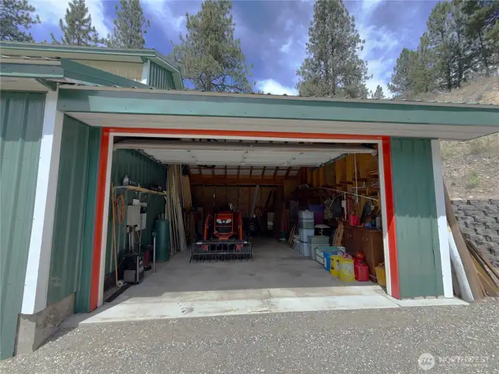 Attached to the shop is an additional enclosed garage,
