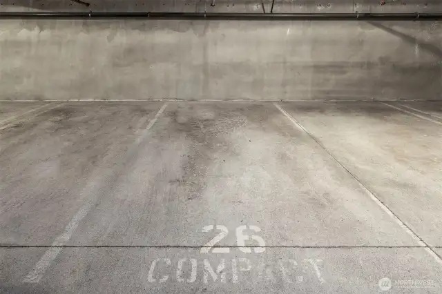 Secure parking garage w/ assigned stall. Additional storage locker in garage