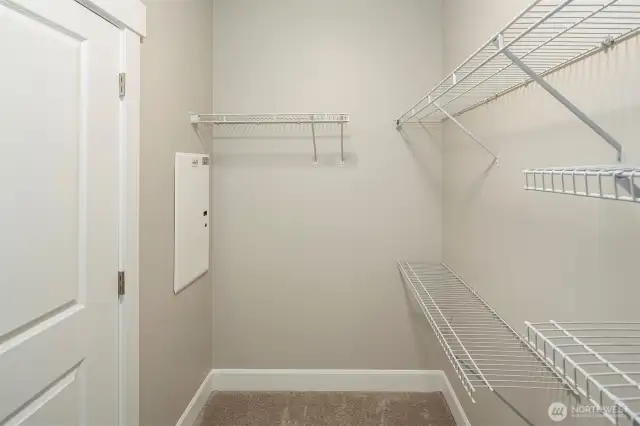 Spacious walk-in closet in bedroom