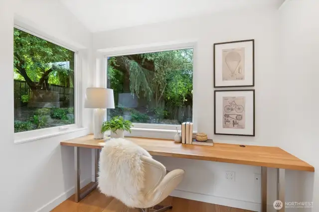 Lavish primary suite with french doors that open to deck, huge walk in closet with organizer, separate office niche an spa like bath. THIS IS THE PICTURE OF THE OFFICE NICHE OFF THE PRIMARY BEDROOM