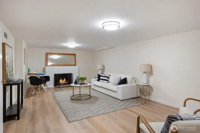 Huge great room, rec-room in the lower level with fireplace.