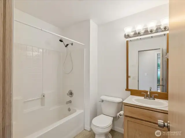 Full bath on main floor across hall from bedrooms 1 & 2