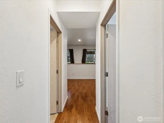 View from bottom of stairs facing towards backyard