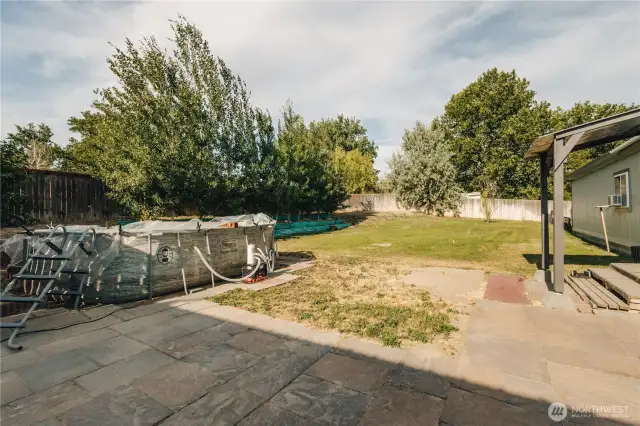 Out your back door to cool off in your pool