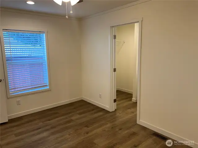 Another view of the primary bedroom.