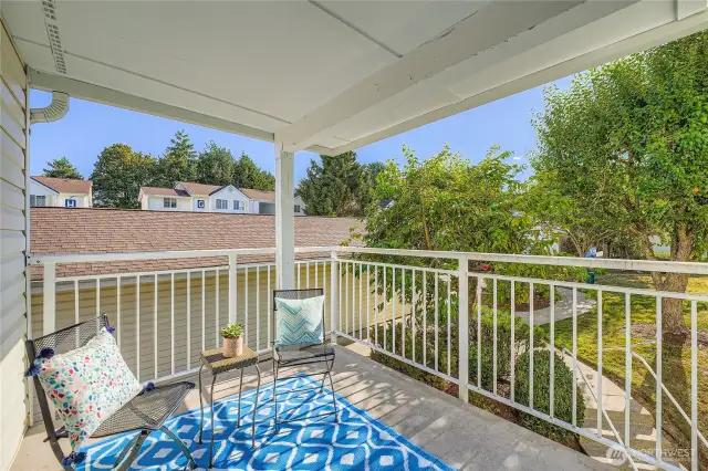 Balcony overlooks green space.. so peaceful