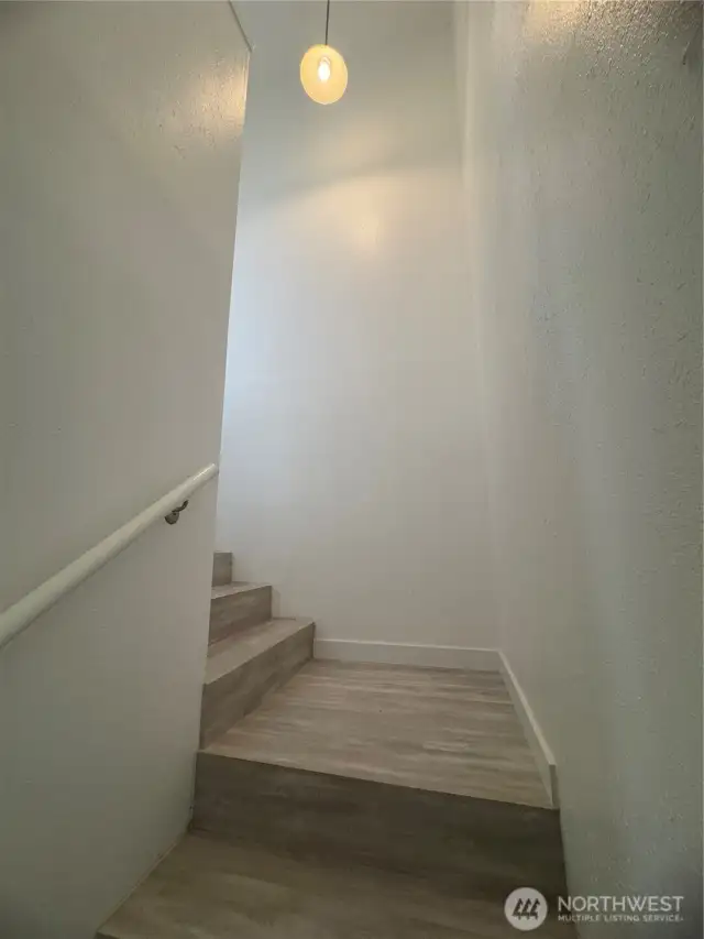 Stairs to primary bedroom