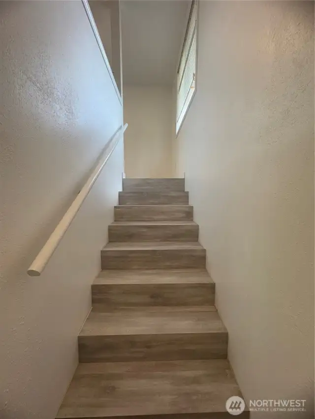 Stairs to primary bedroom