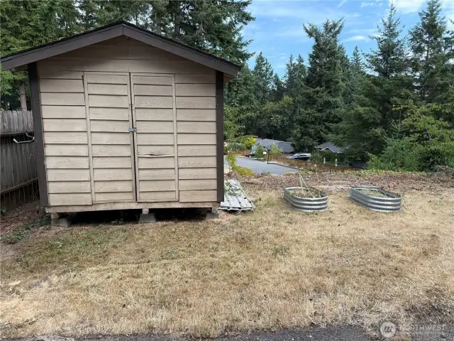 Shed and raised garden spaces