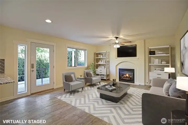 Cozy family room off Kitchen with access to covered patio.