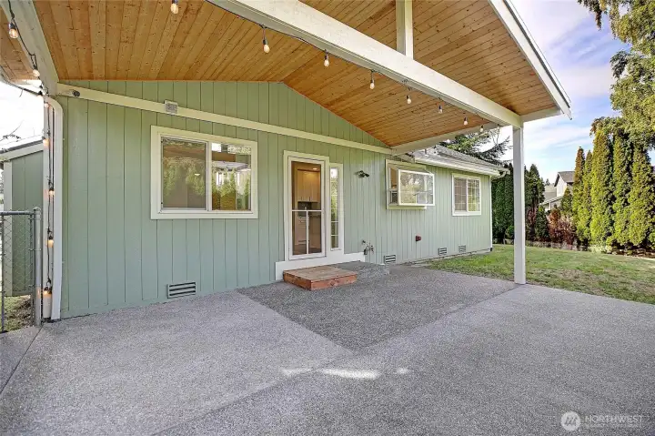 Huge covered patio off family room/kitchen.