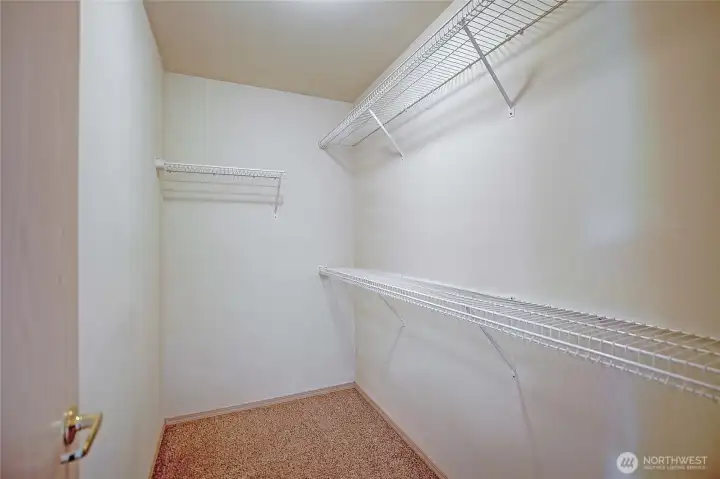 Walk-in closet in primary.