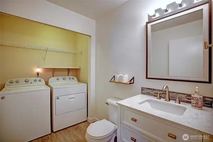 1/2 bath with Laundry on main level.