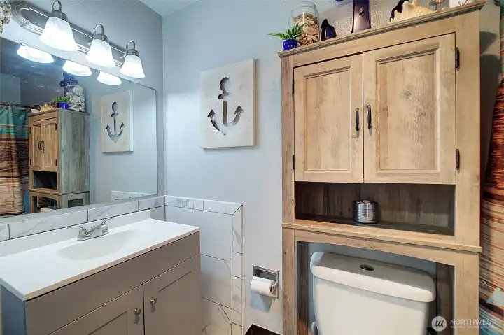 Full bath in upstairs hallway.