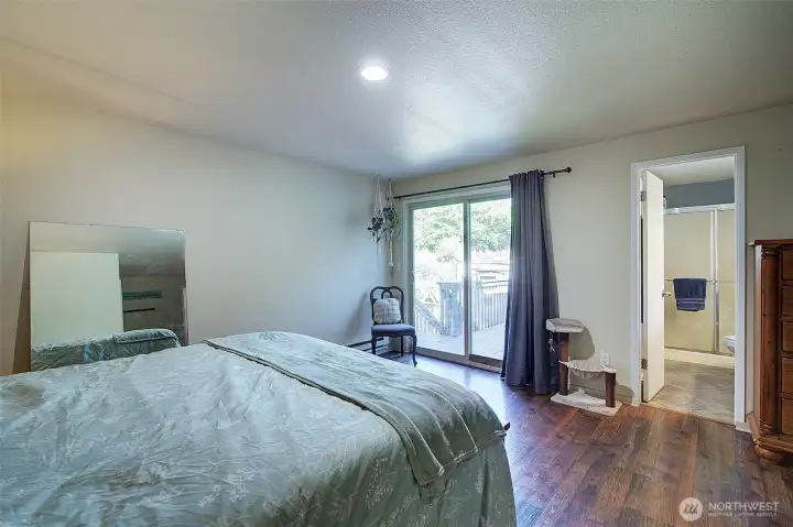 Primary has it's own door out to the deck.