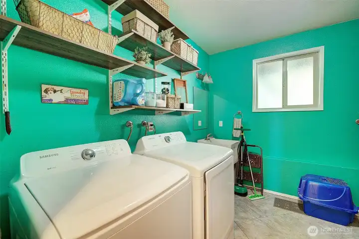 Utility room and 1/2 bath downstairs.