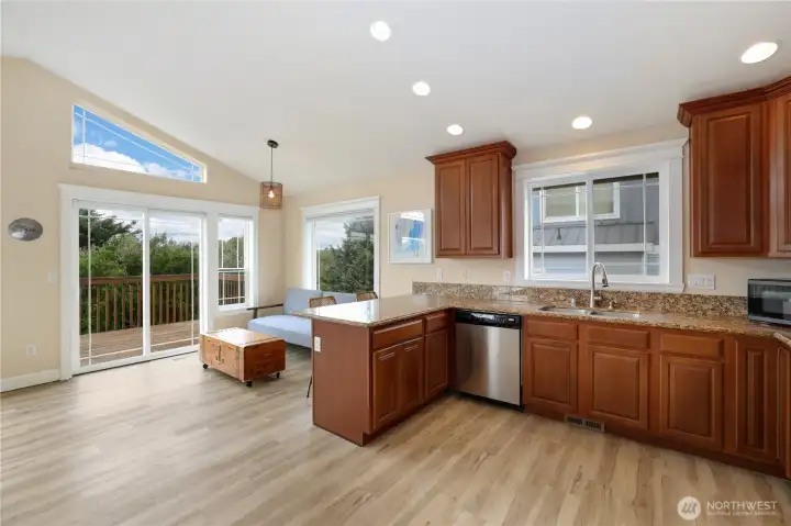 Great breakfast nook or seating area leading out to one of three decks
