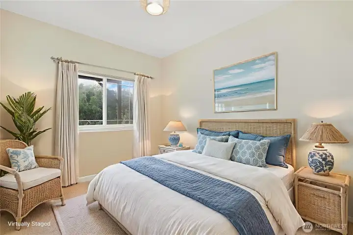 Downstairs bedroom with tall ceilings