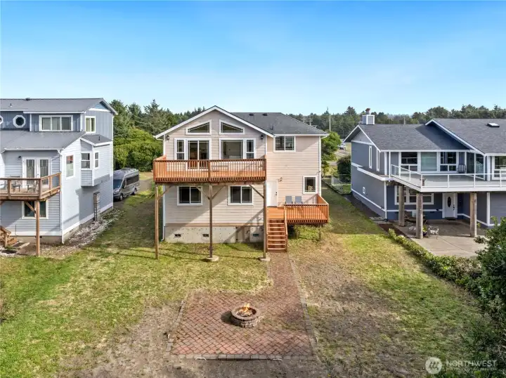 Large yard with firepit, tons of room to entertain!