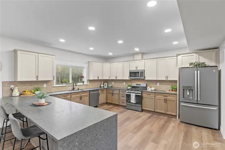 OMG, have you seen a more beautiful Kitchen? New Two-Tone Cabinets, Slate Appliances w/Gas Range, Tumbled Quartz Counters and Laminate Flooring. OMG, have you seen a more beautiful Kitchen? New Two-Tone Cabinets, Slate Appliances w/Gas Range, Tumbled Quartz Counters and Laminate Flooring.