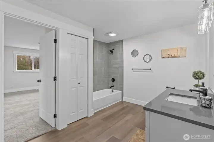 Another view of the hall bath showing the custom tile shower.