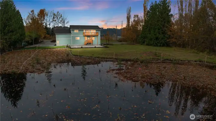 View from behind the wetlands area. You pretty much have your own pond! Yes, ducks visit!